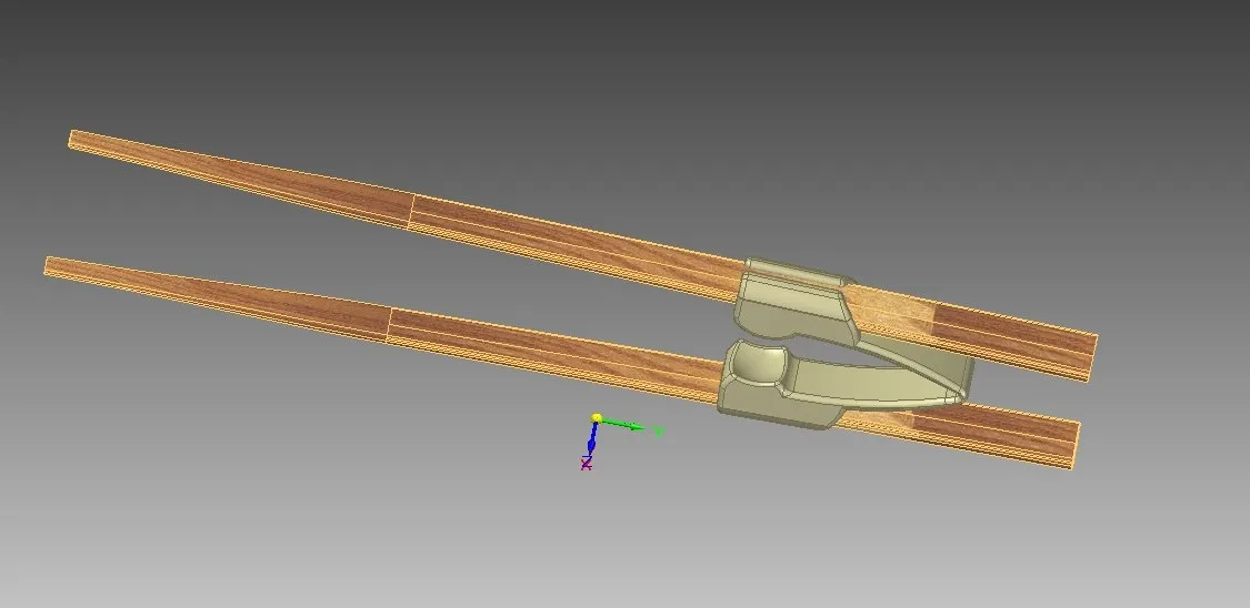 Pomocnik do pałeczek w użyciu — produkt konsumencki MAJ-PLAST